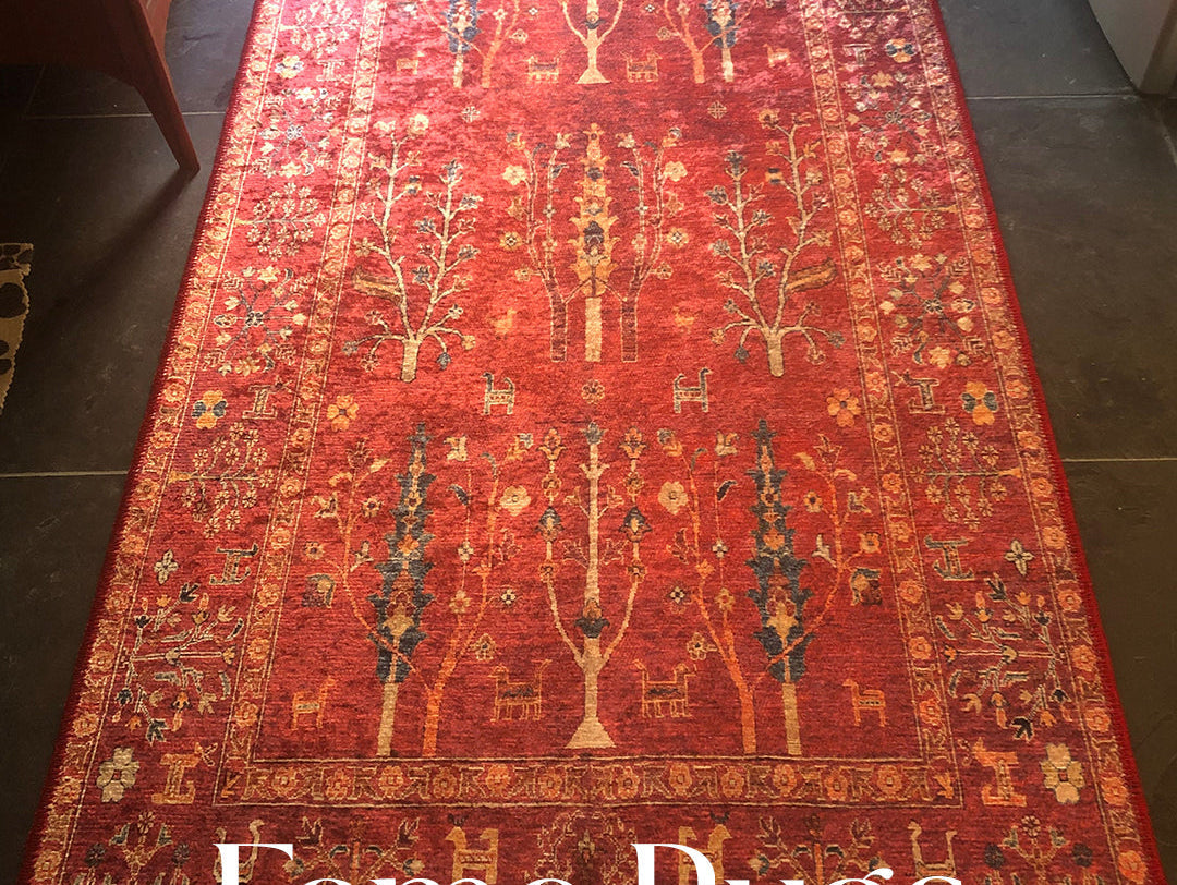 Bohemian red runner rug featuring intricate tribal patterns and details, adding a bold, artistic touch to a hallway or entryway with its rich vintage-inspired design.
