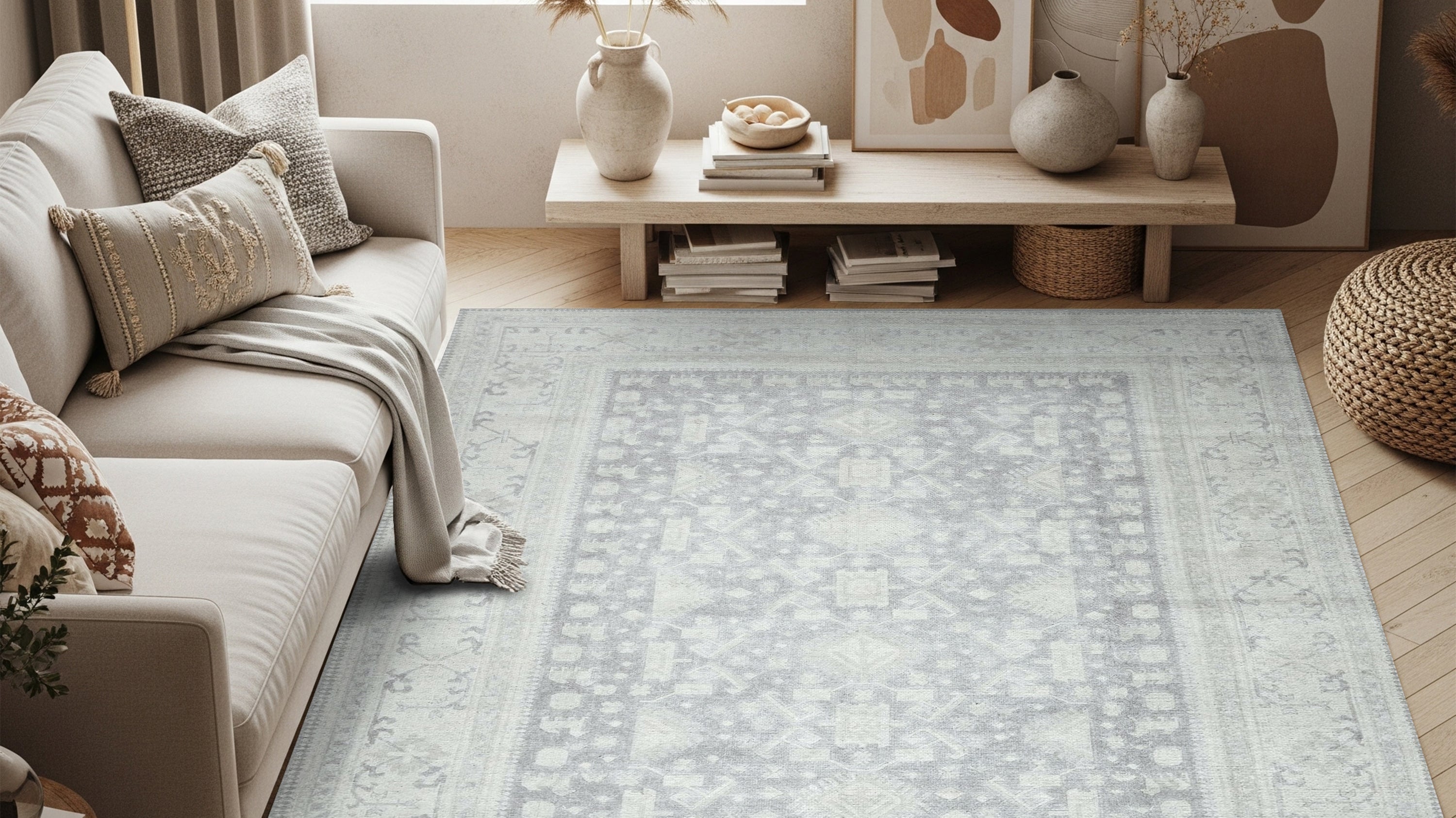 Blue and beige area rug in a neutral living room creating a warm and balanced modern look