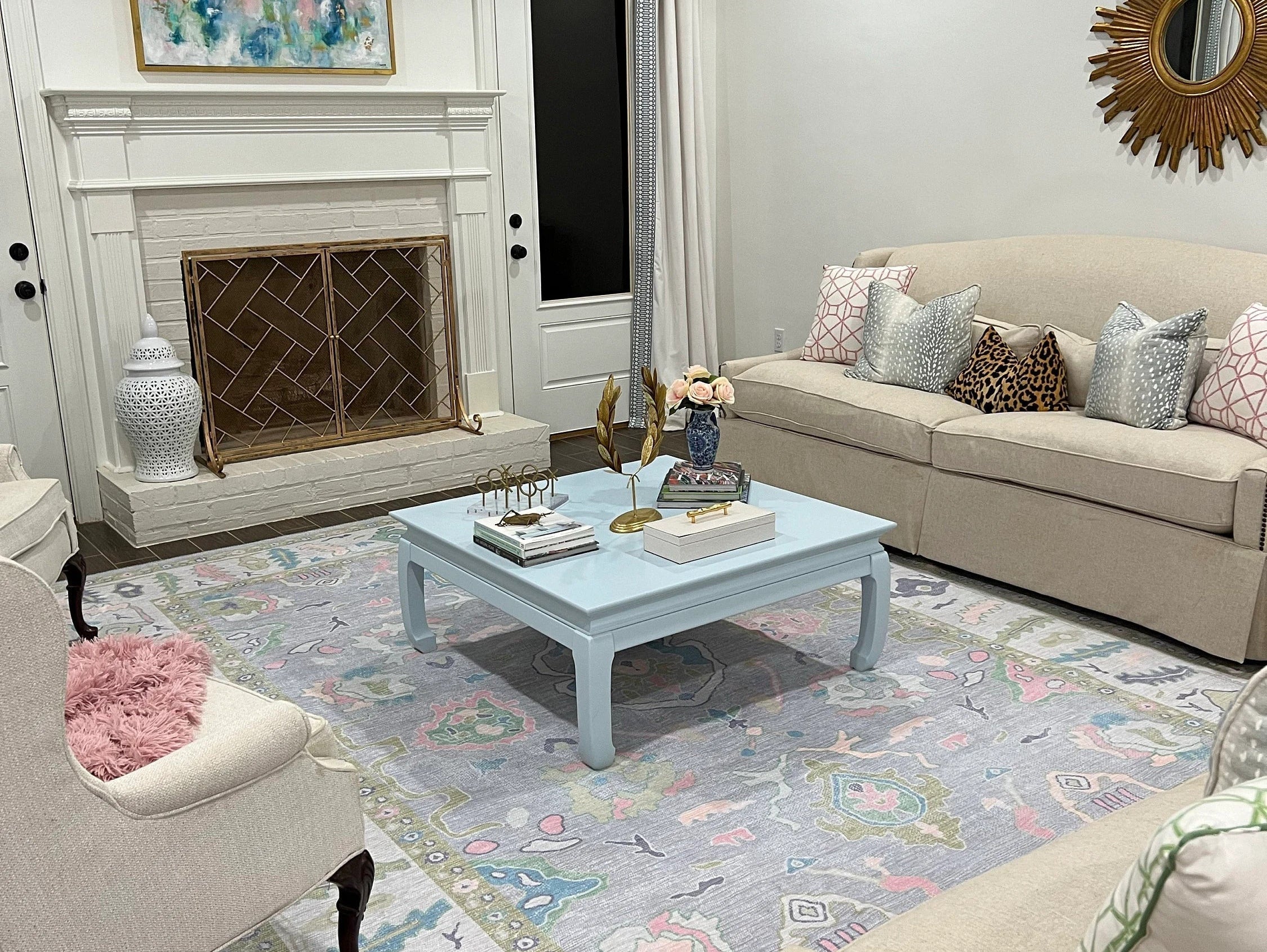 Lavender floral area rug in a romantic spring living room with soft pastel decor