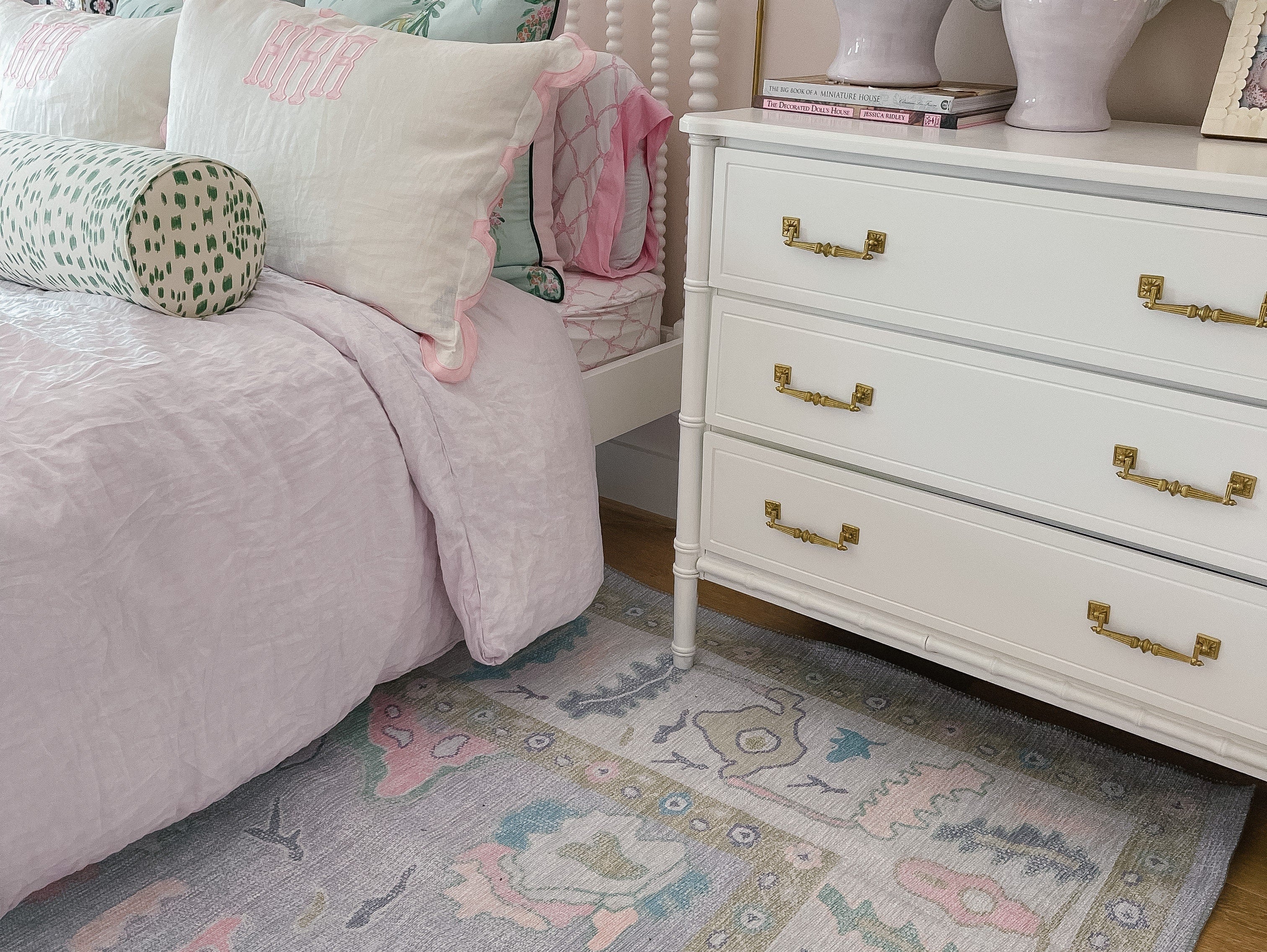 Aviana pastel lavender Oushak rug in a bright bedroom, creating a soft, elegant, and relaxing summer retreat.