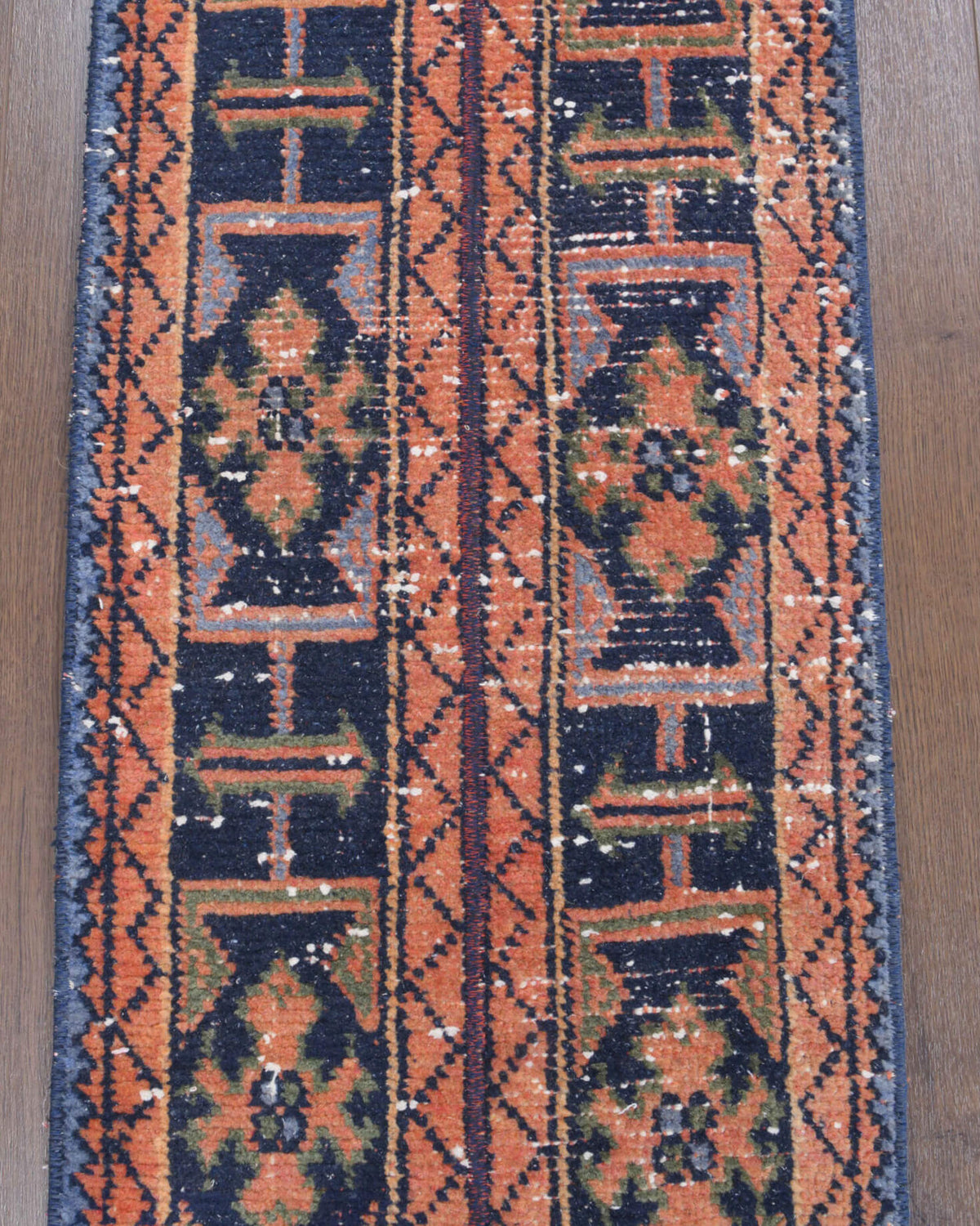 Aretepetra runner: 1970s handmade Anatolian runner with oriental motifs and fabric backing