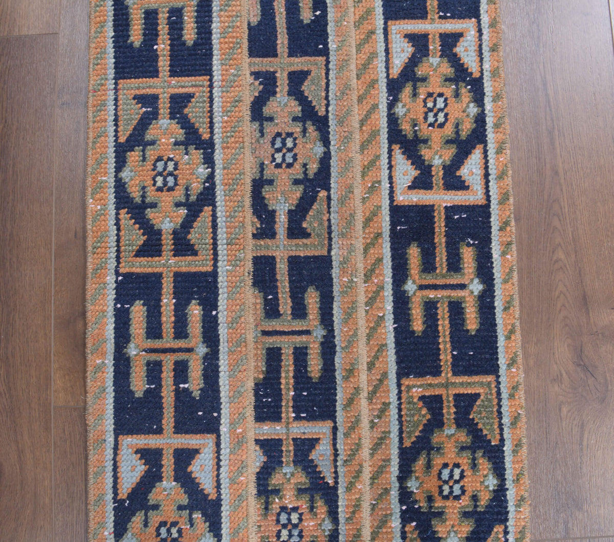 Anemopetra runner: 1970s handmade Anatolian runner with oriental motifs and fabric backing