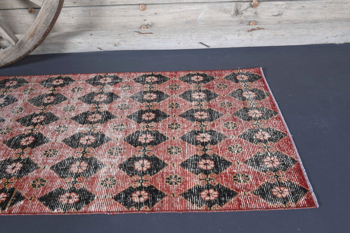 Silenur runner: 1950s handmade Anatolian runner with ikat motifs and cotton backing