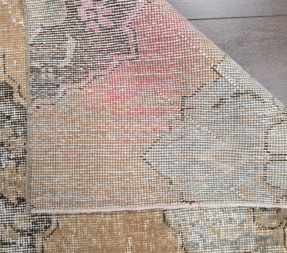 Cerenlale runner: 1960s handmade Anatolian runner with floral motifs and cotton backing