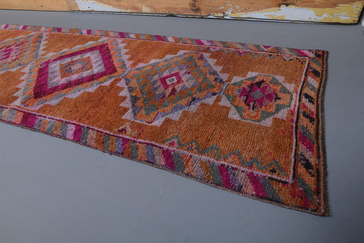 Ouranodike runner: 1970s handmade Anatolian runner with ikat motifs and cotton backing