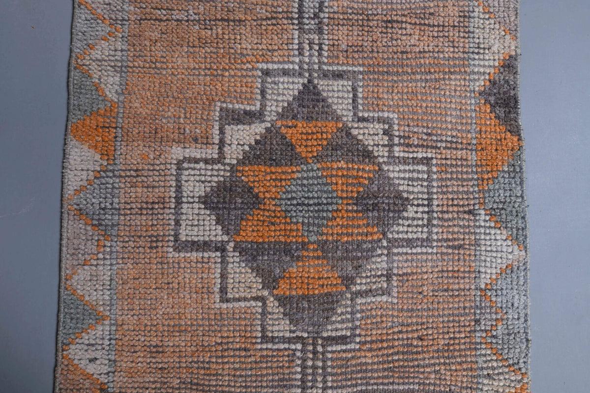 Pelagia runner: 1970s handmade Anatolian runner with geometric motifs and cotton backing