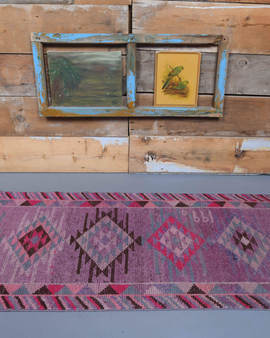 Nesrinsel runner: 1970s handmade Anatolian runner with geometric motifs and cotton backing