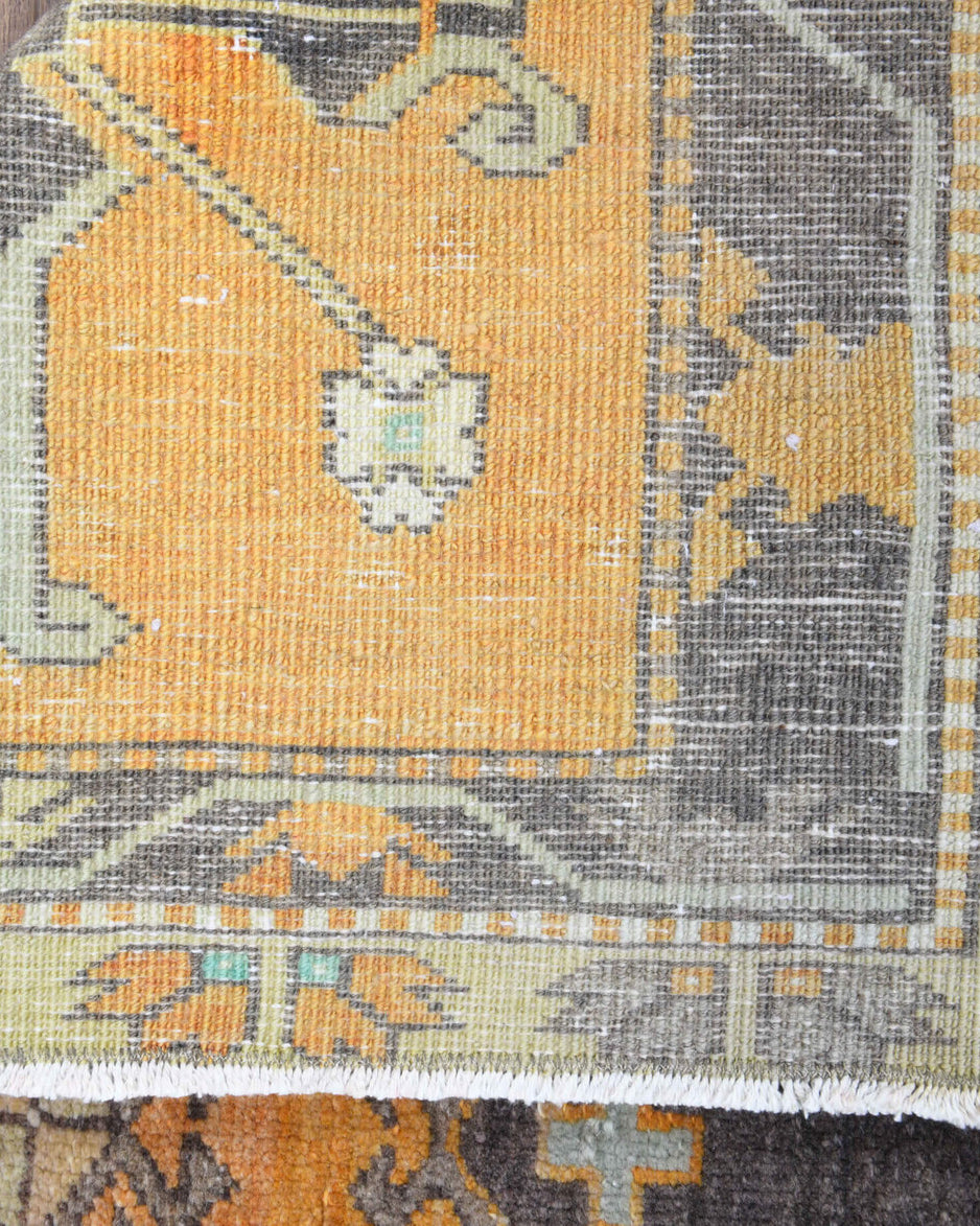Sabahsel runner: 1970s handmade Anatolian runner with oriental motifs and cotton backing