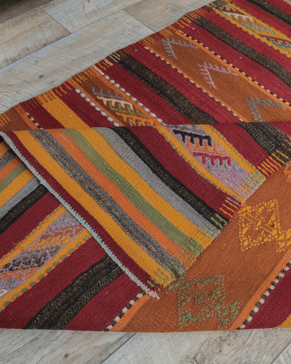 Nausomene runner: 1960s handwoven flatweave Anatolian runner with striped motifs