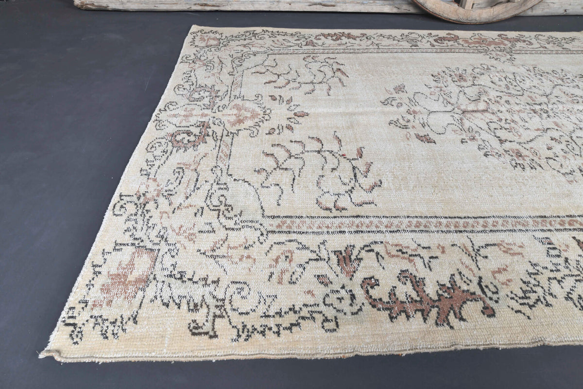 One-of-a-kind 1970s Anatolian antique washed vintage area rug in wool, 5'9" x 9'3"