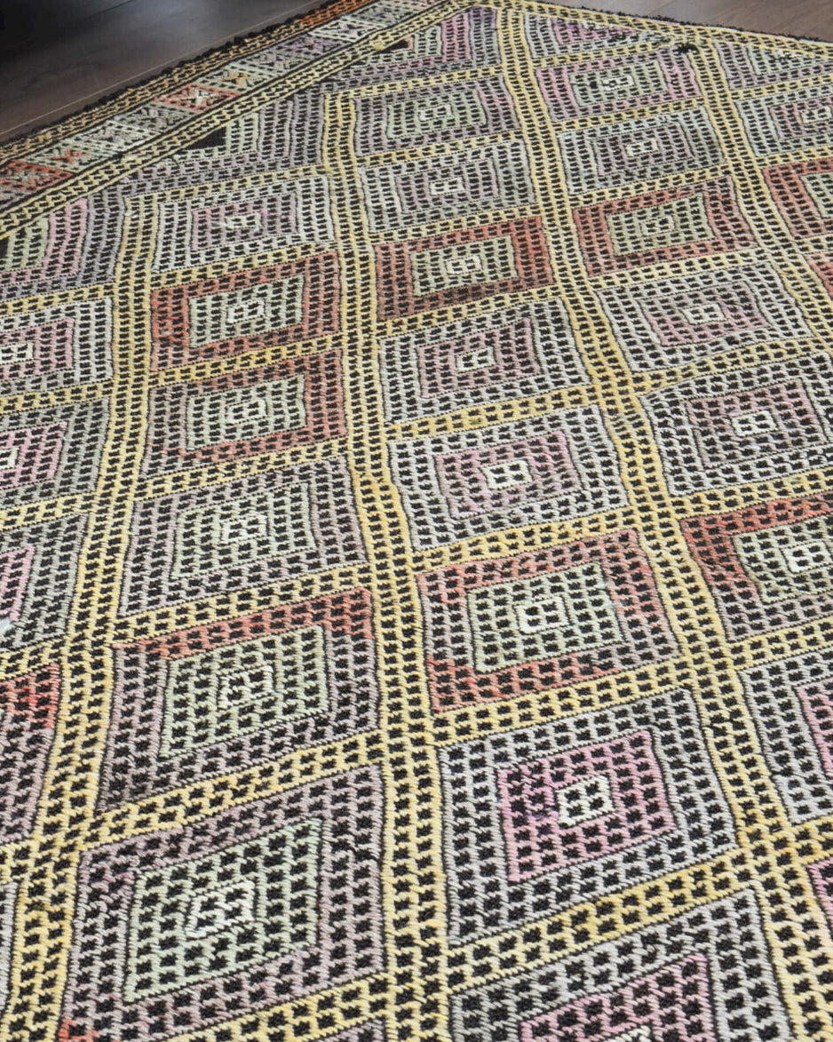 Safaksev kilim: 1960s handwoven flatweave Anatolian kilim with ikat motifs