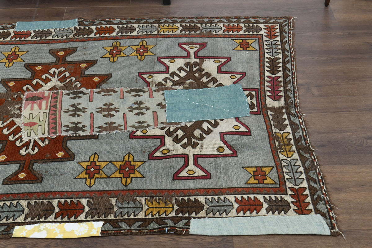 Nihanefsan rug: 1970s handmade Anatolian rug with abstract motifs and fabric backing