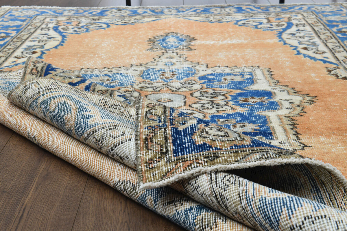 Pervakusa rug: 1970s handmade Anatolian rug with oriental motifs and cotton backing