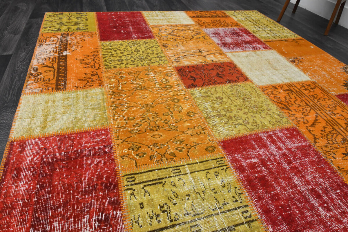 Charitomira rug: 1950s handmade Anatolian rug with floral motifs and fabric backing