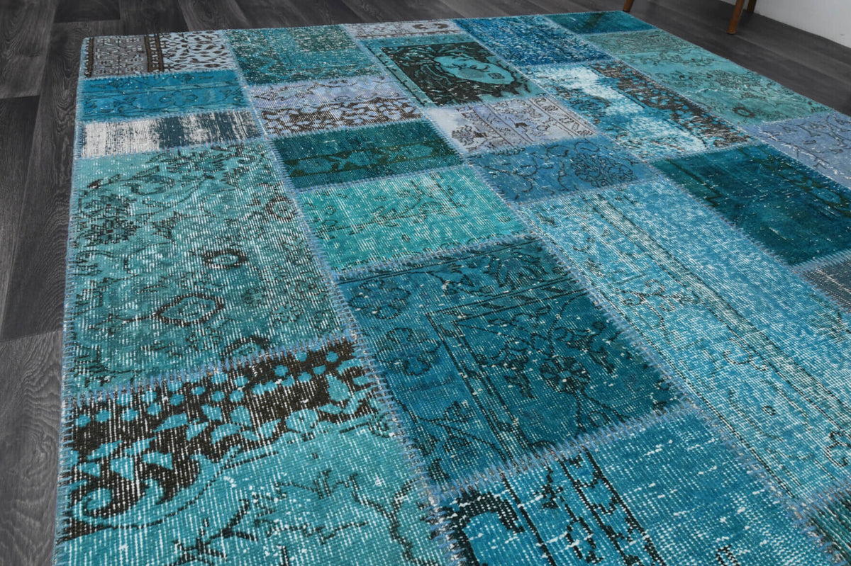 Cerenbahar rug: 1960s handmade Anatolian rug with solid motifs and fabric backing
