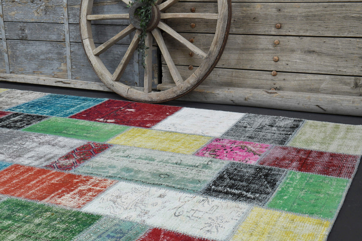Beharsah rug: 1970s handmade Anatolian rug with floral motifs and fabric backing