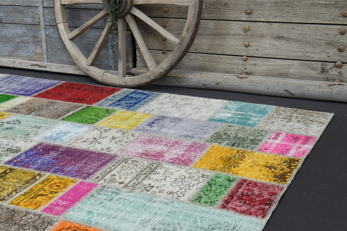 Aysehan rug: 1960s handmade Anatolian rug with solid motifs and fabric backing
