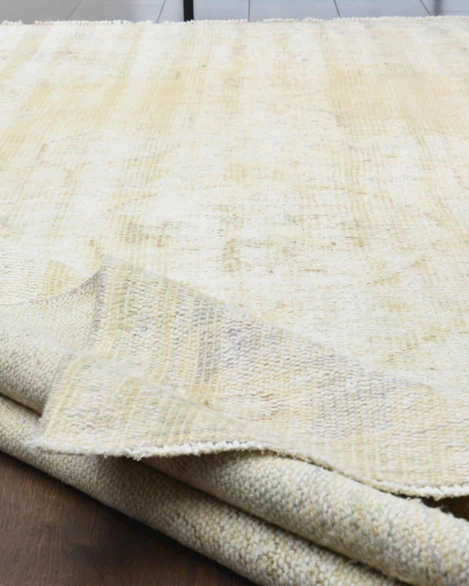 One-of-a-kind 1940s Anatolian antique washed vintage area rug in wool, 5'9" x 9'5"