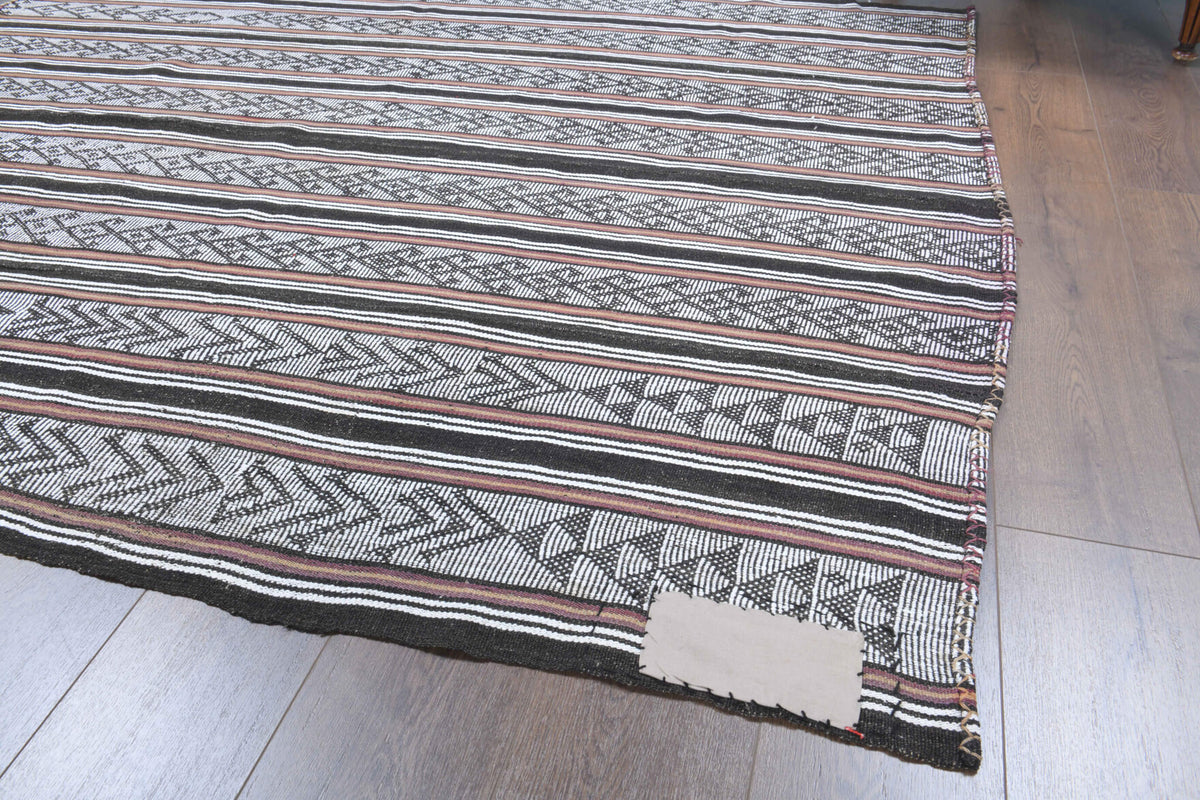 Anthopheme kilim: 1960s handwoven flatweave Anatolian kilim with ikat motifs