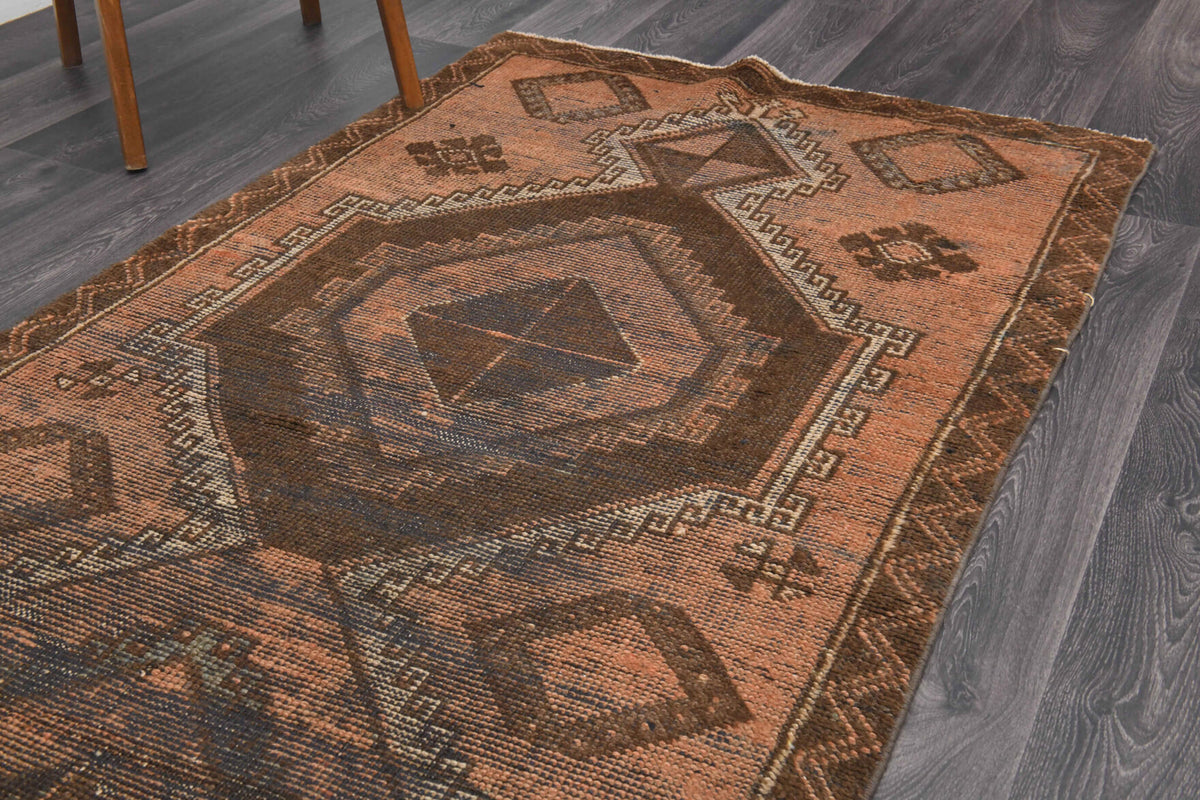 Fundater runner: 1970s handmade Anatolian runner with tribal motifs and cotton backing