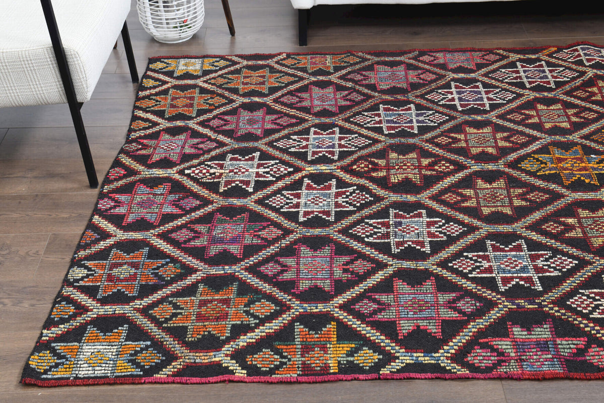 Gamze kilim: 1960s handwoven flatweave Anatolian kilim with ikat motifs