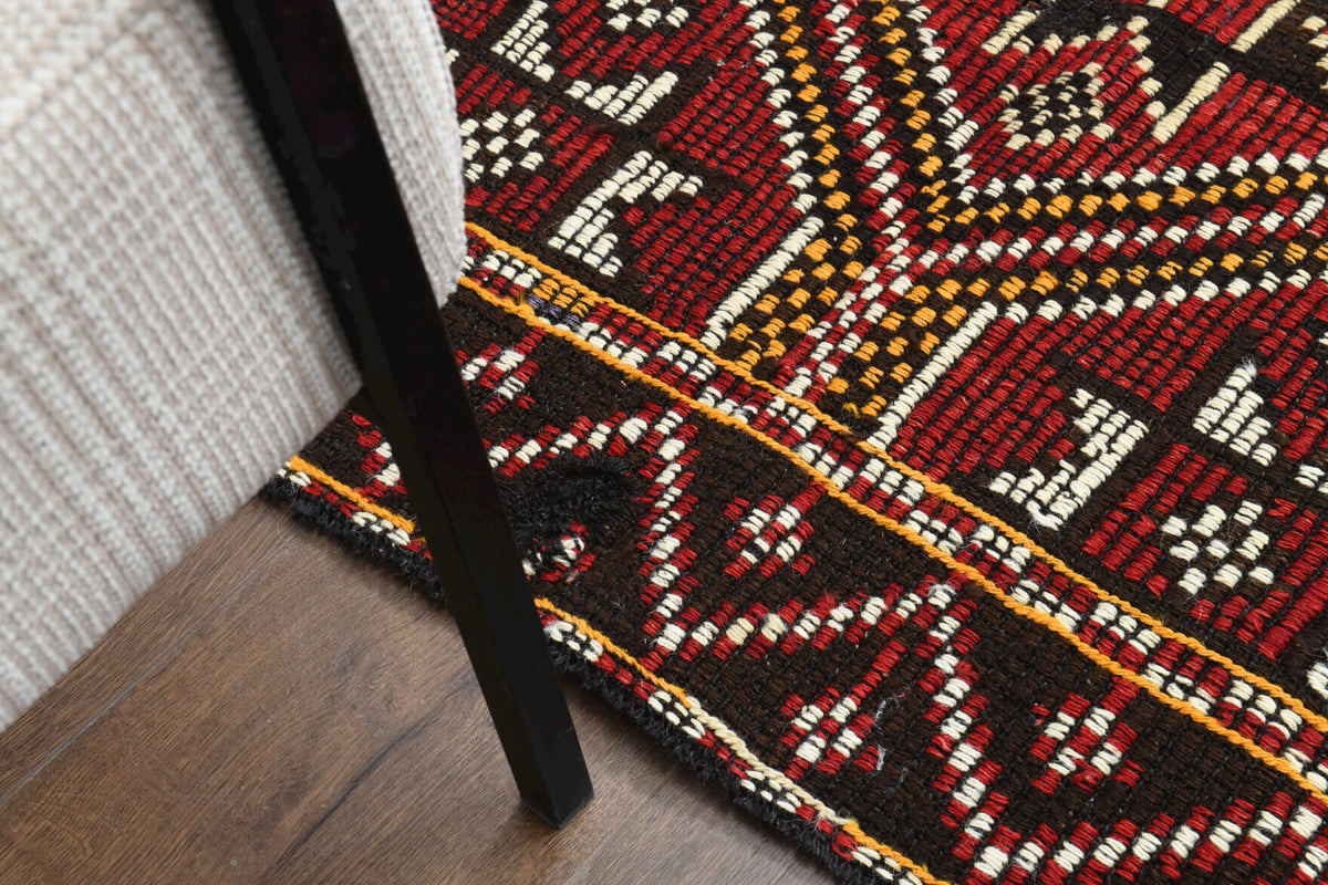 Kydophyllis kilim: 1960s handwoven flatweave Anatolian kilim with ikat motifs