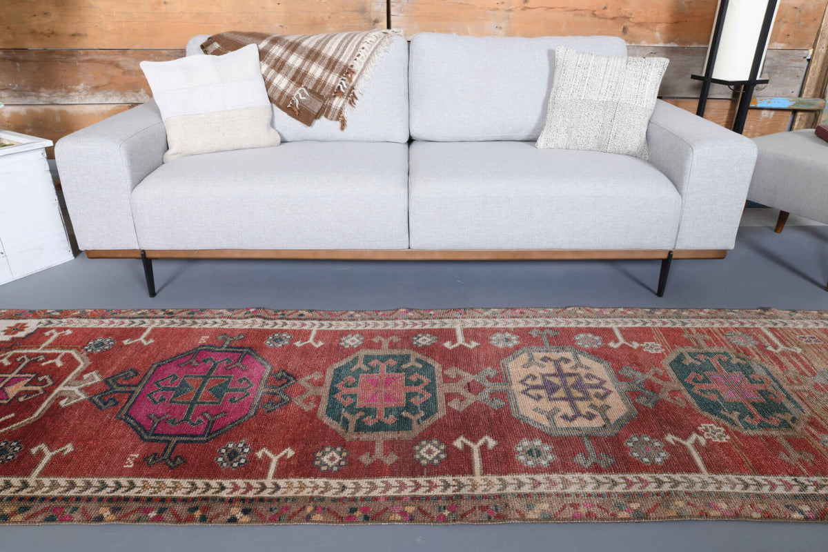 Leylanaz runner: 1970s handmade Anatolian runner with oriental motifs and cotton backing