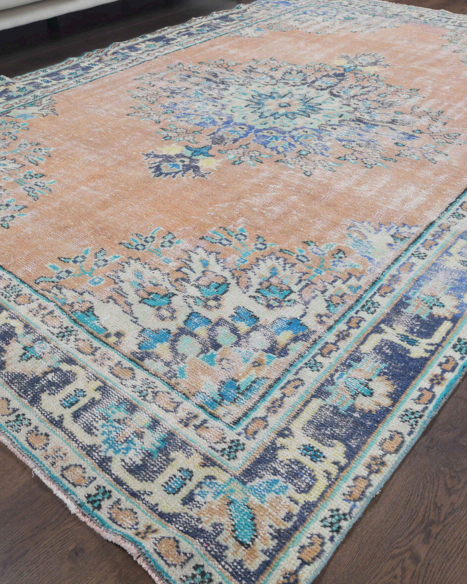 Kalliphora rug: 1970s handmade Anatolian rug with oriental motifs and cotton backing