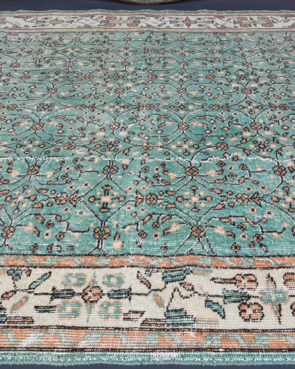 Berraknihal rug: 1970s handmade Anatolian rug with floral motifs and cotton backing