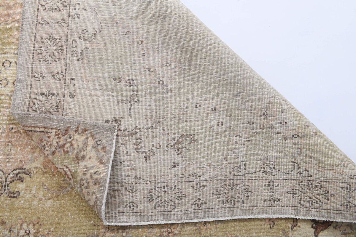 Nevsalnaz rug: 1970s handmade Anatolian rug with oriental motifs and cotton backing
