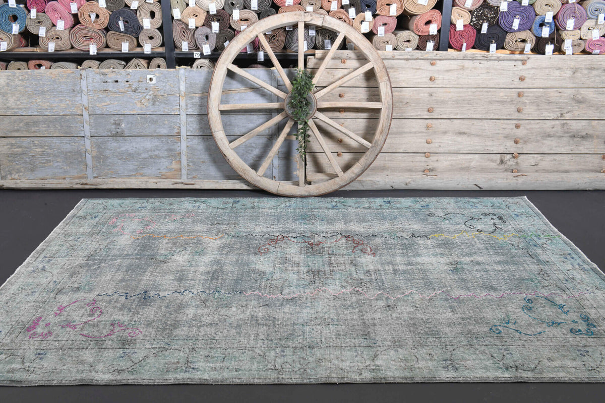 One-of-a-kind 1950s Anatolian distressed vintage area rug in wool, 5'9" x 9'4"