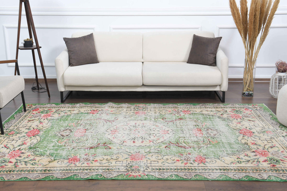 Peitho rug: 1970s handmade Anatolian rug with floral motifs and cotton backing