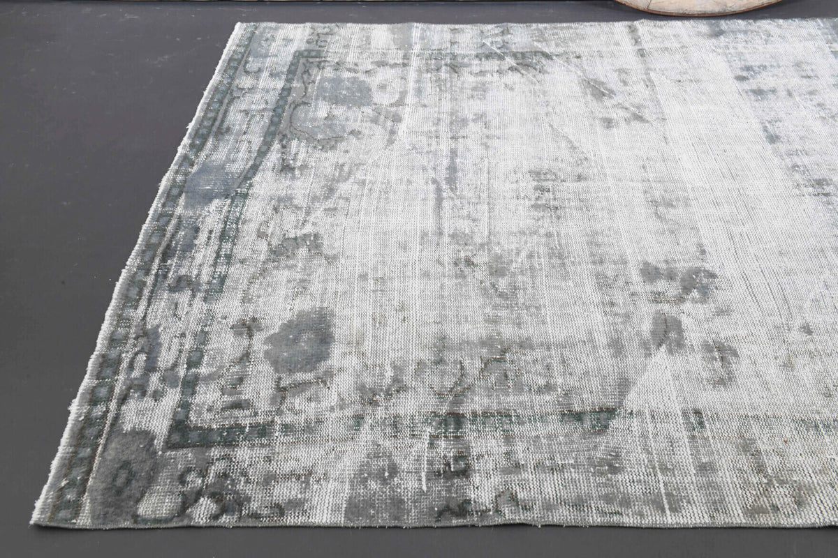 One-of-a-kind 1970s Anatolian distressed vintage area rug in wool, 5'7" x 8'10"