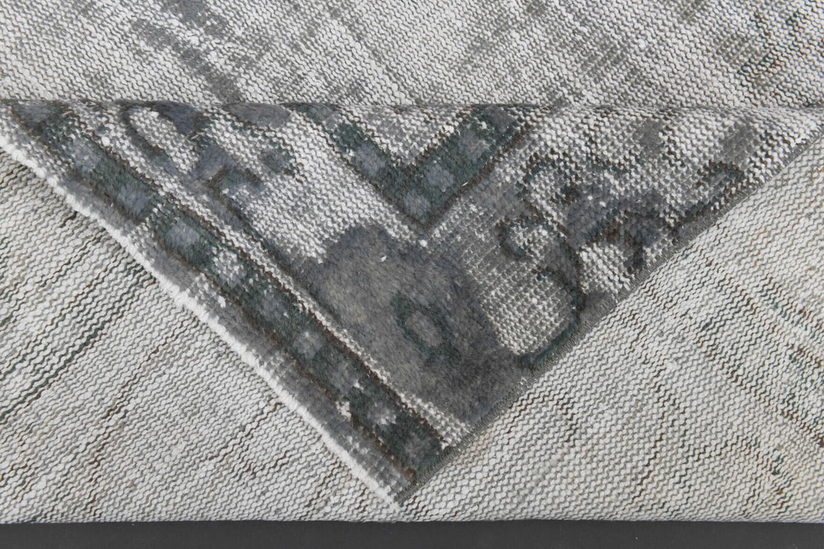 Hand-crafted Anatolian distressed vintage rug Sedefara in wool, 1970s