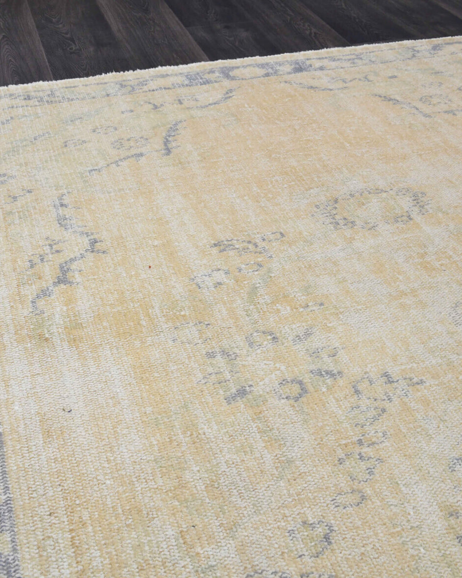 Handmade wool rug from Anatolia, Turkey – Faded Colored Antique Area Rug 5'7" x 9'5"