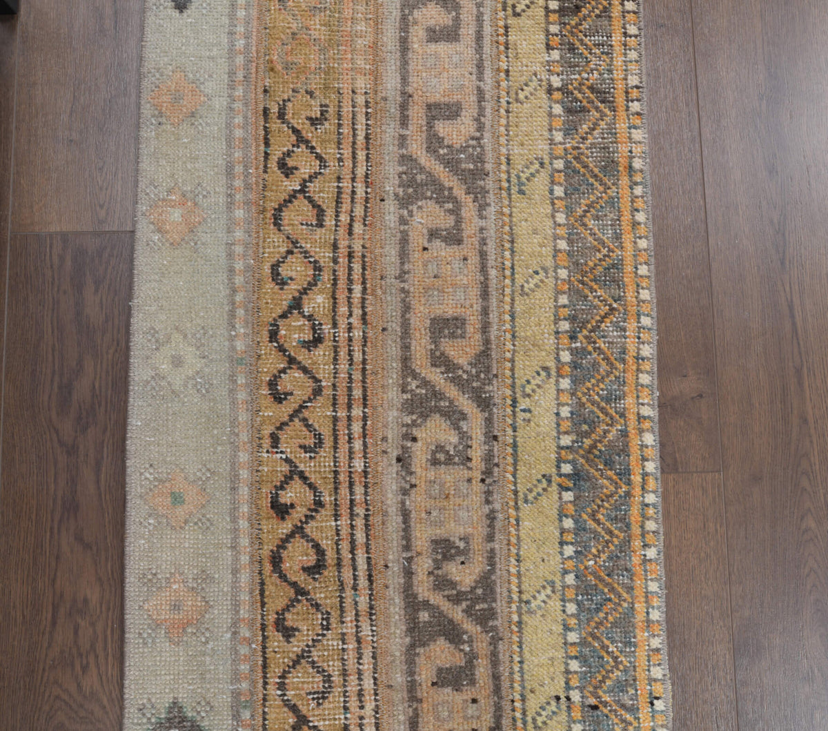 Husnil runner: 1970s handmade Anatolian runner with ikat motifs and fabric backing