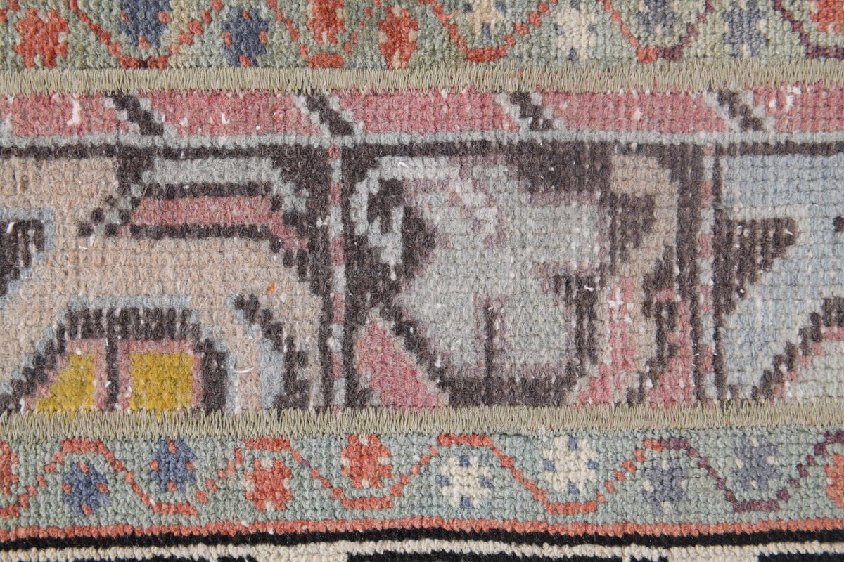 Ruhbahce rug: 1970s handmade Anatolian rug with oriental motifs and fabric backing