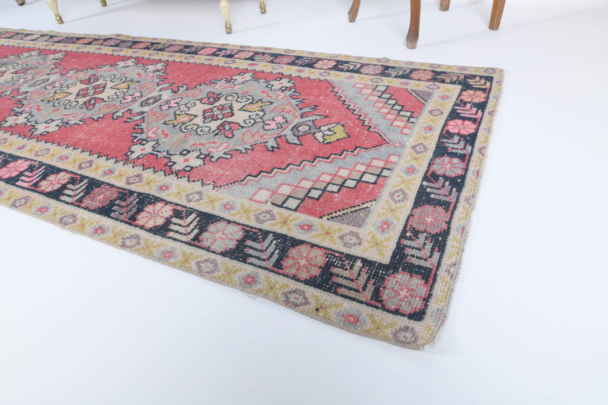 Phaenolampe runner: 1970s handmade Anatolian runner with oriental motifs and cotton backing