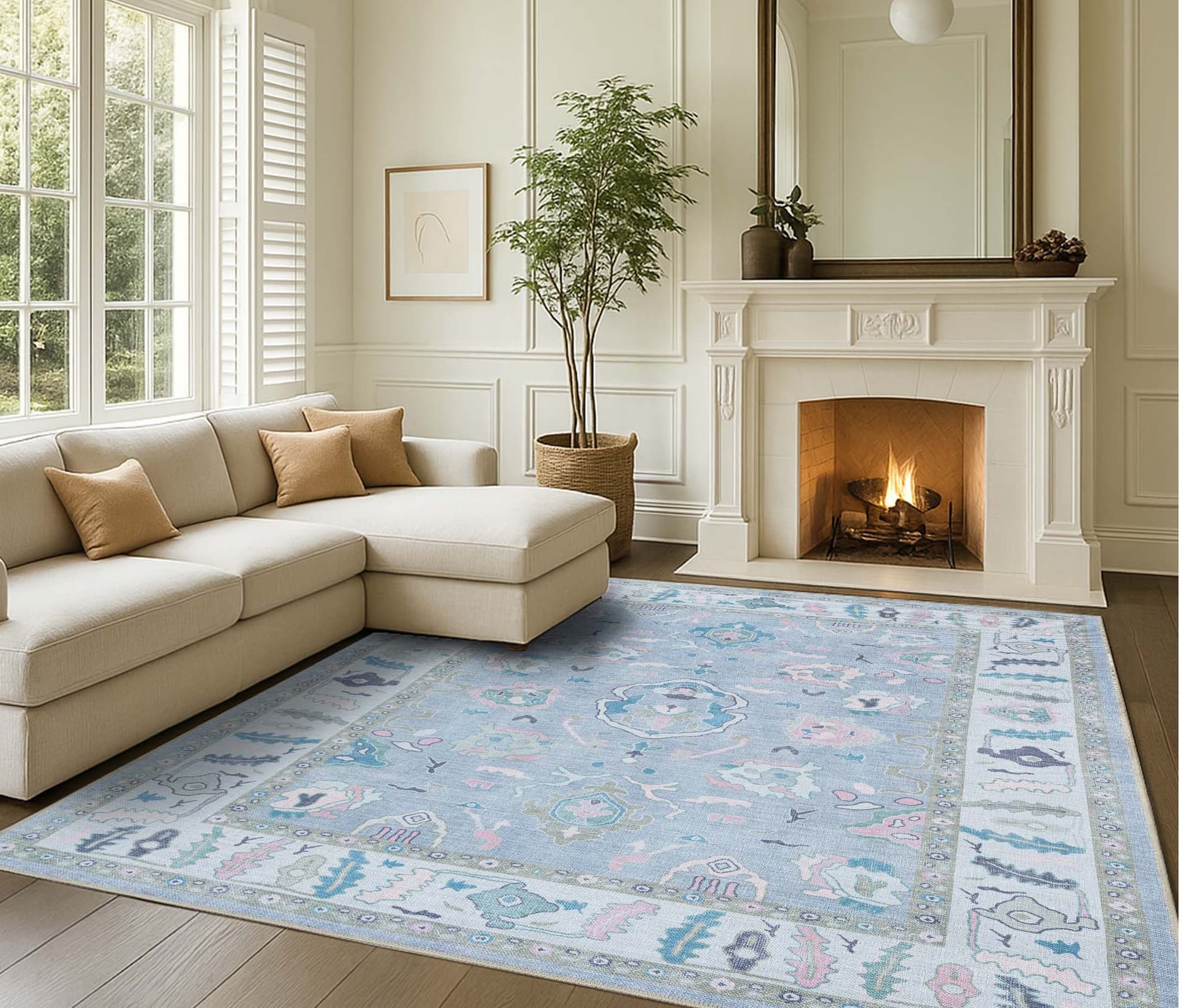 Minimalist living room styled with a soft Oushak rug, adding subtle pattern and warmth to the clean, modern space.
