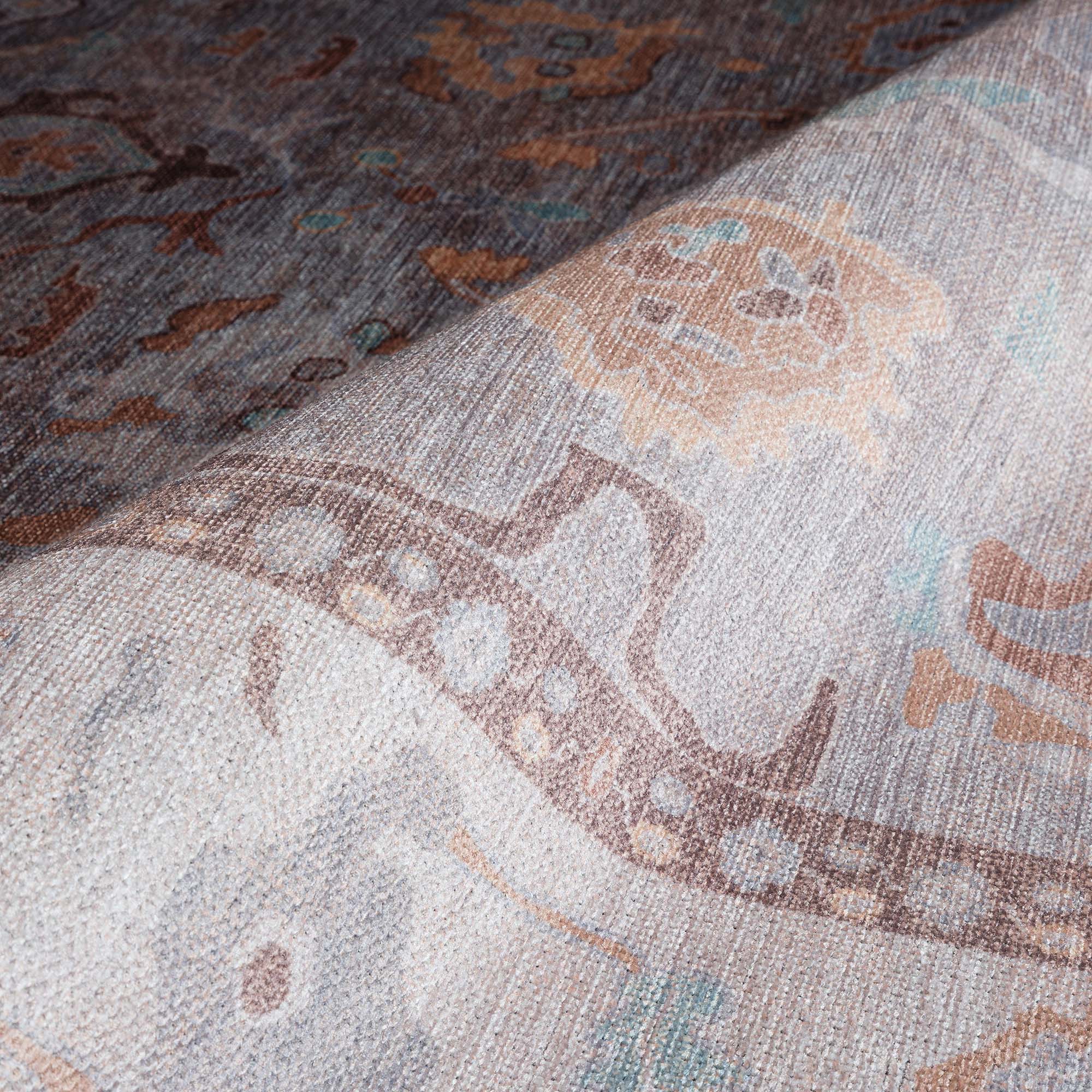 Close-up view of rug texture highlighting the difference between handwoven and machine-made rugs.