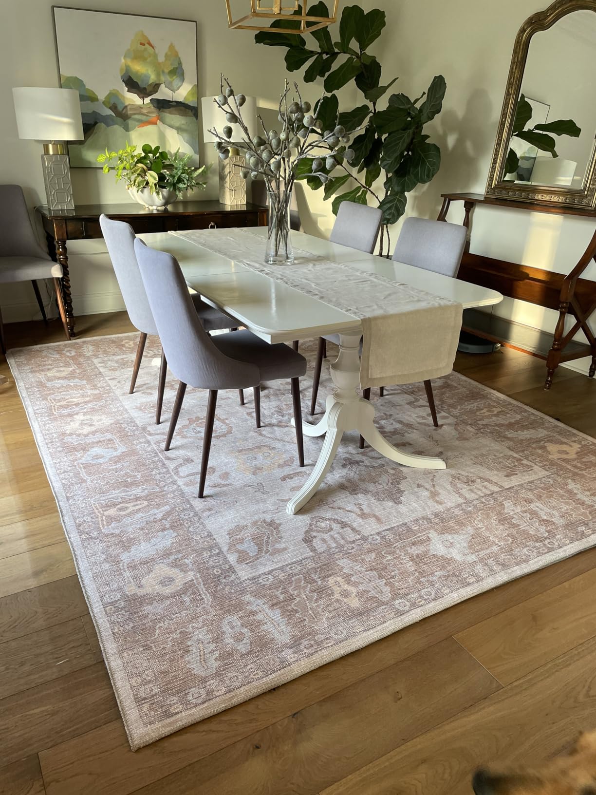 Neutral washable rug styled in a dining room, combining practical rug care with elegant interior design.