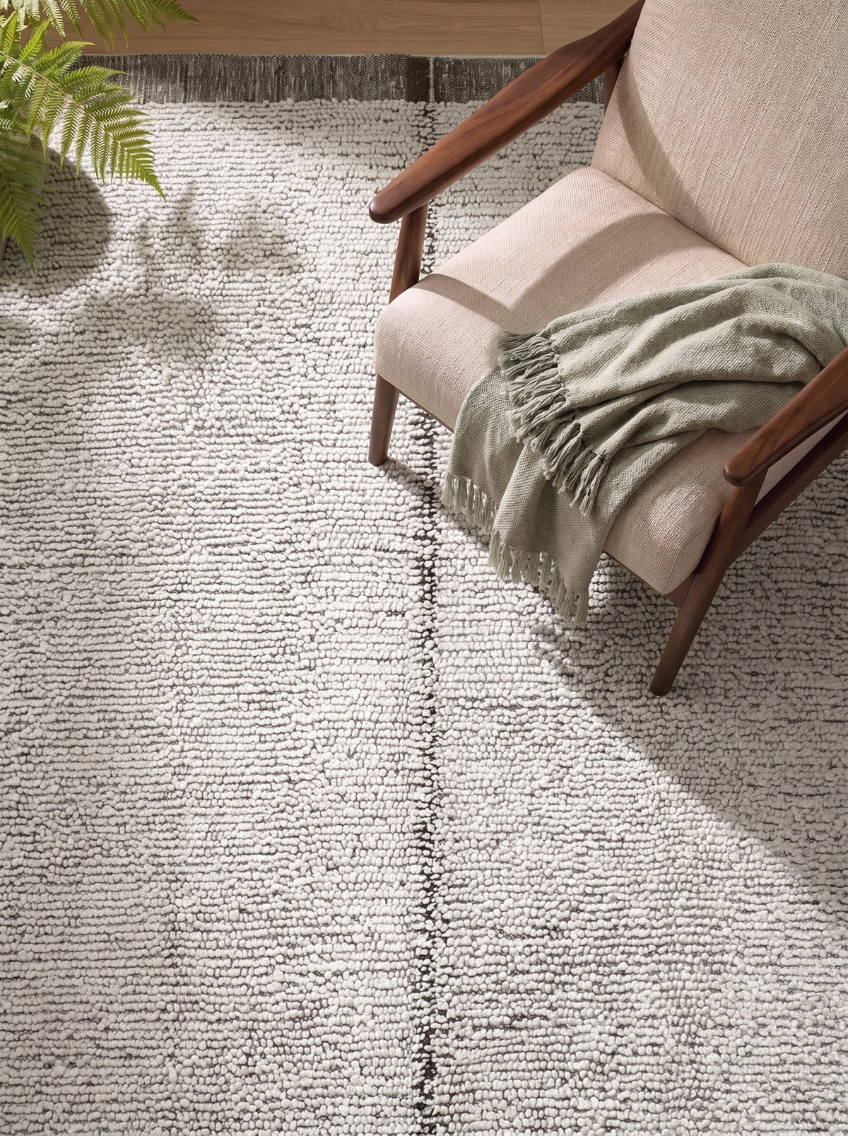 Handwoven wool Kilim rug featuring a modern bordered grid design in cream, and warm beige.  