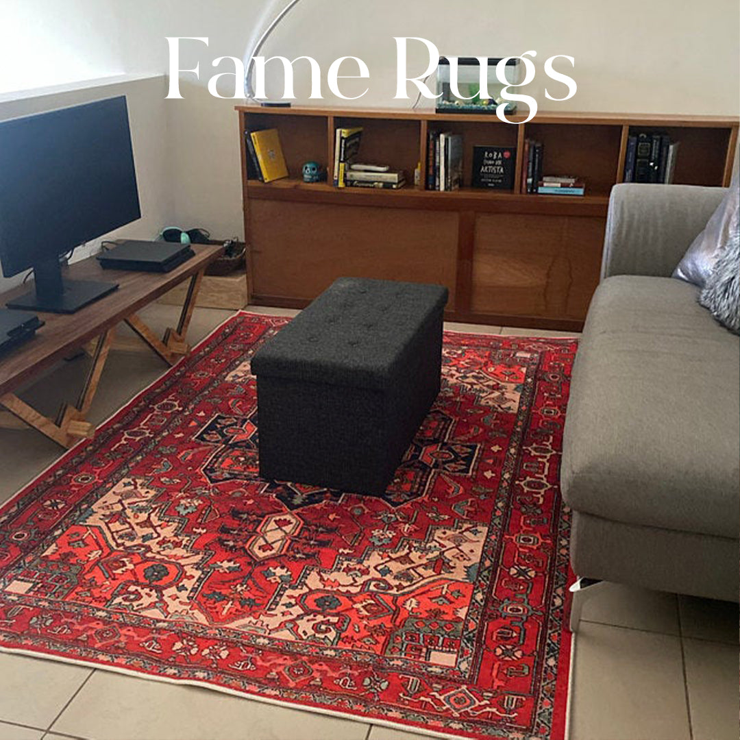 Vintage-style red area rug in a cozy living room with neutral furniture and warm décor accents.