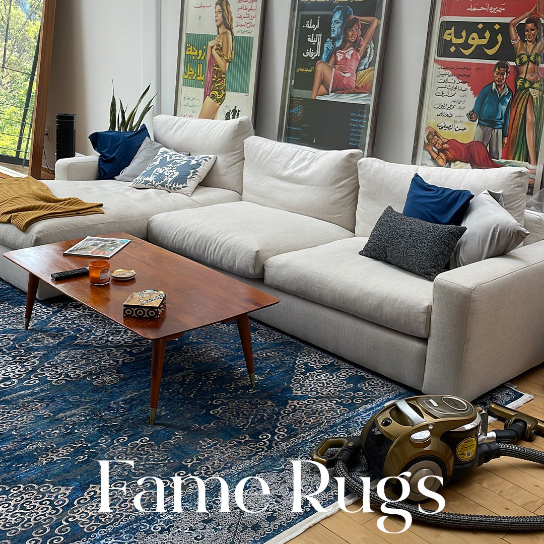 Affordable living room rug styled with a sofa, showcasing budget-friendly home décor ideas.