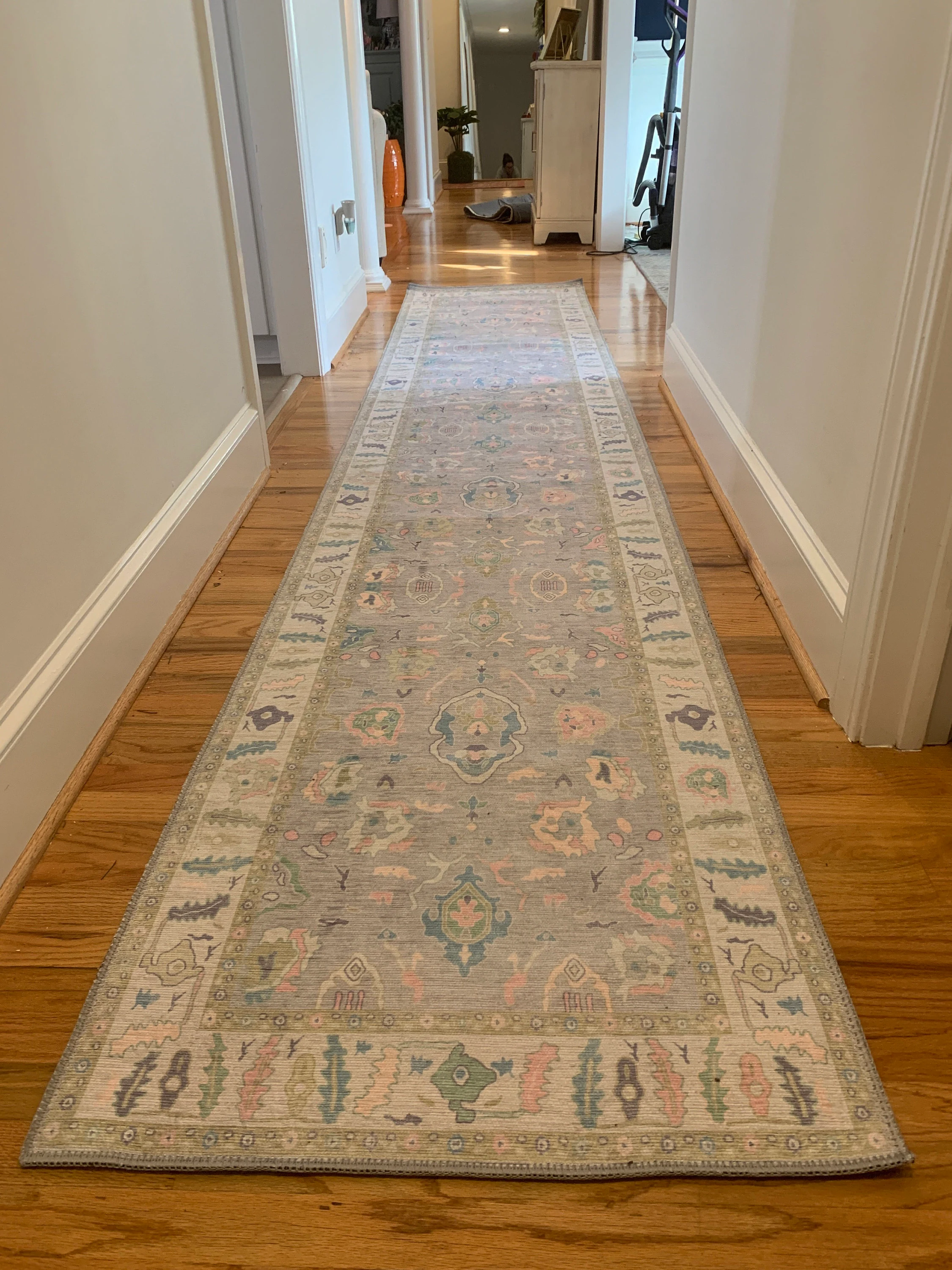 Hallway runner rug styled to guide size, design, and placement in a modern home corridor