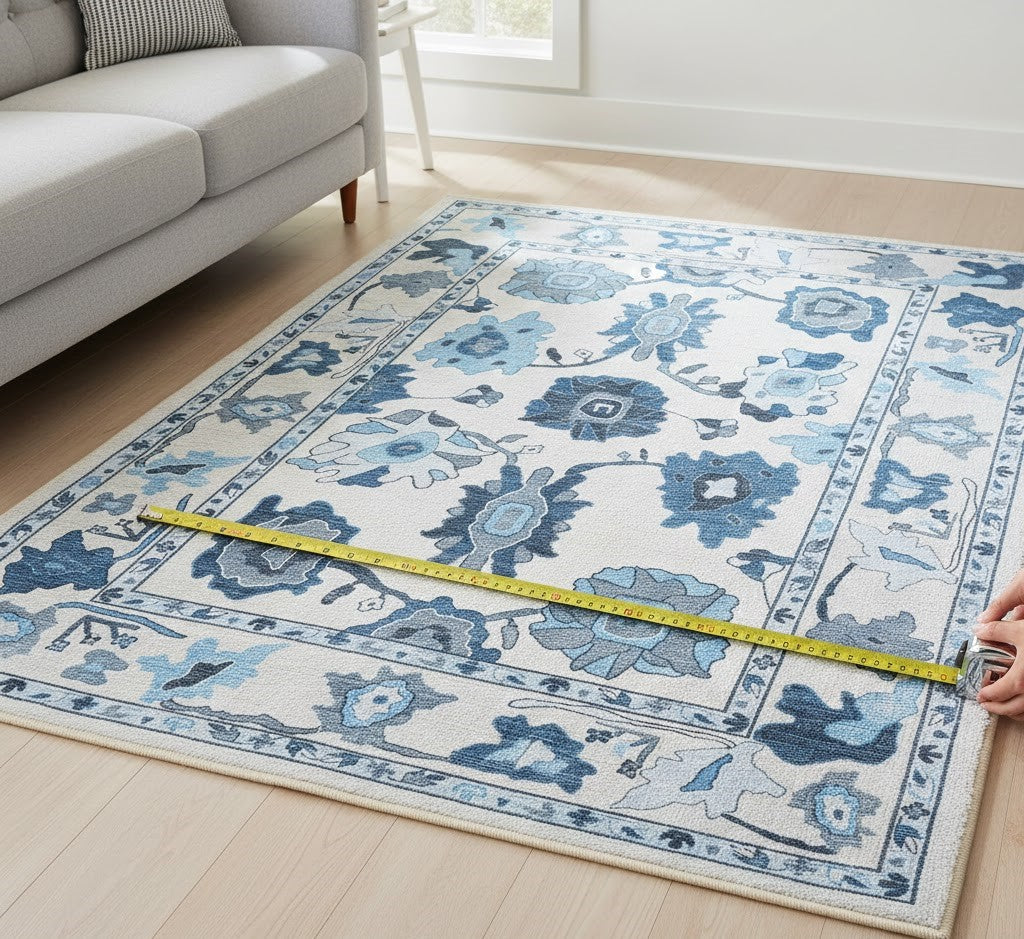 Living room showing a rug measured for proper furniture placement.