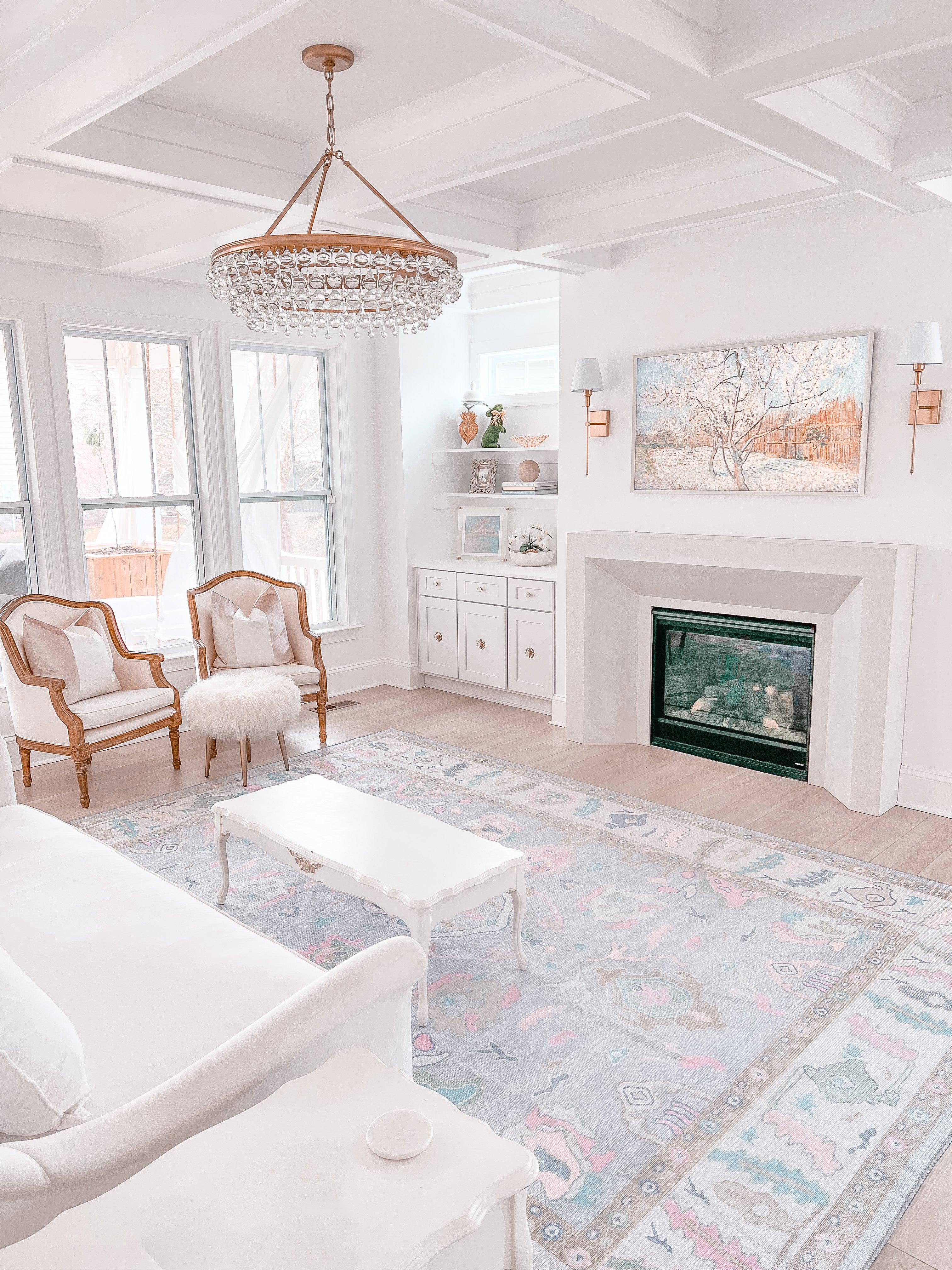 Living room featuring a stylish rug that complements the furniture and décor, demonstrating tips from the guide on matching rugs with home interiors.
