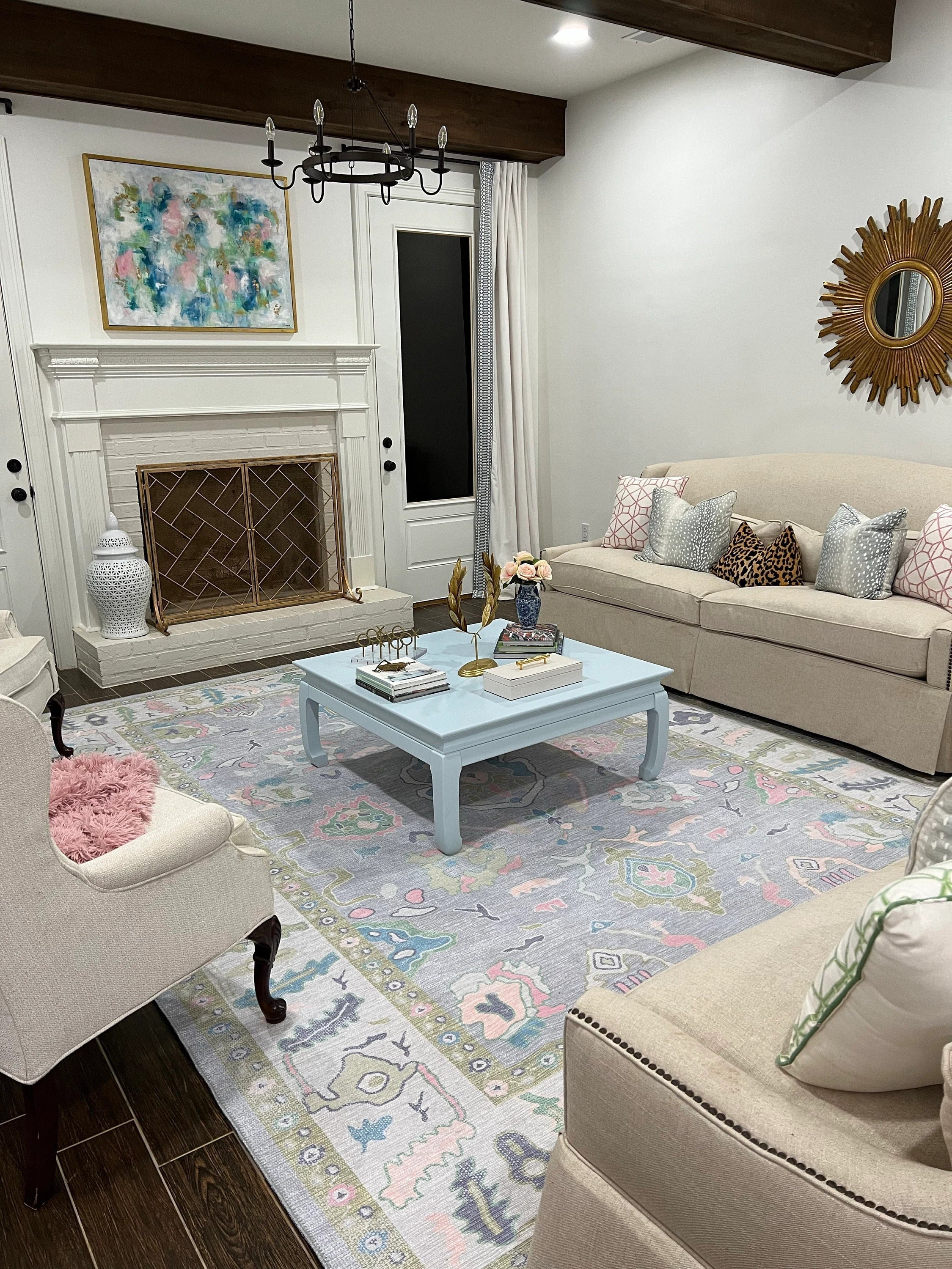 Lavender floral area rug in a romantic spring living room with soft pastel decor
