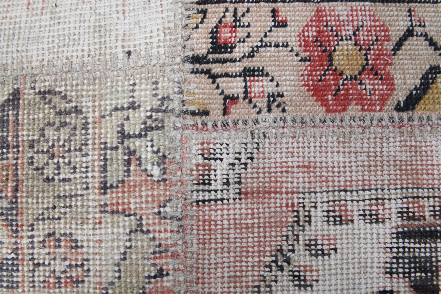Amaranthsthene rug: 1970s handmade Anatolian rug with tribal motifs and fabric backing