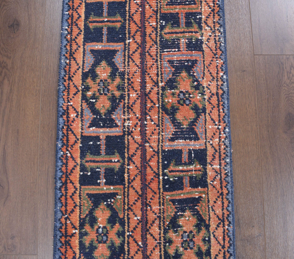 Aretepetra runner: 1970s handmade Anatolian runner with oriental motifs and fabric backing
